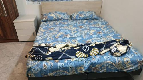 Postel nebo postele na pokoji v ubytování Keerthana Residency