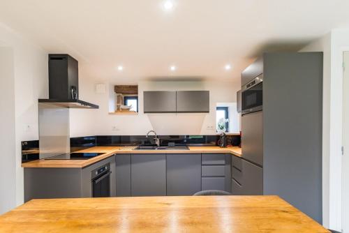 Kuchyň nebo kuchyňský kout v ubytování Manoir de Kervegan : Le Logis du Grand Couchant