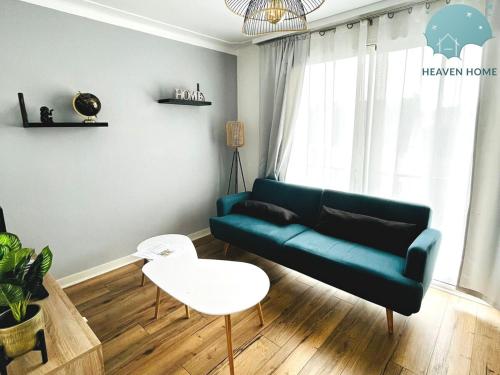 Χώρος καθιστικού στο Charmant appartement proche des commerces et Gare