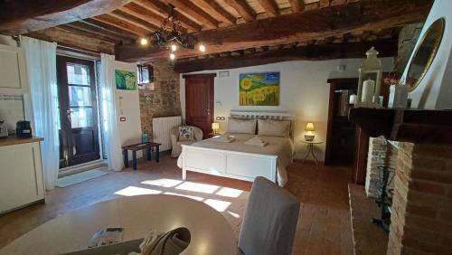 Posezení v ubytování Romantic suite in the village of Castelleone, vicino Deruta, Assisi, Perugia, Montefalco