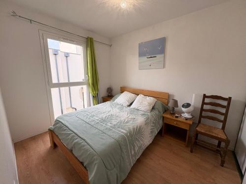 Una cama o camas en una habitación de Del
