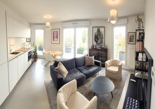 Appartement moderne avec terrasse - 15min de Paris