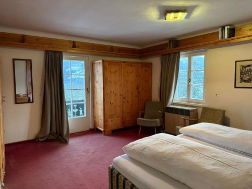 Ένα ή περισσότερα κρεβάτια σε δωμάτιο στο Landhaus Weitblick