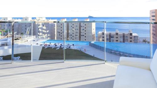 a view of a balcony with a swimming pool at SUNSET SAILORS lovely apartment in Benidorm