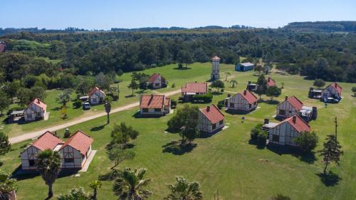 an aerial view of a house in a green field at Country del Sol Complejo Turistico in La Paloma