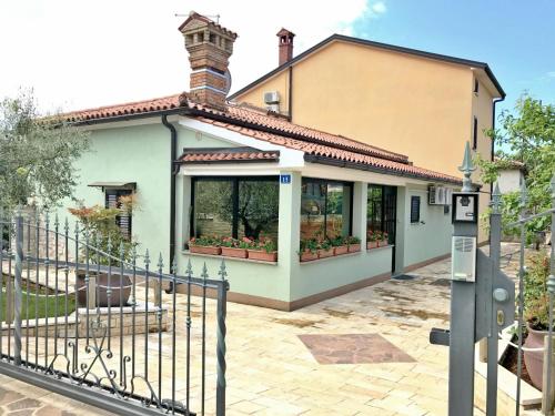 Holiday home with garden and BBQ in Umag