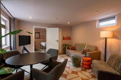 Posezení v ubytování Petit Riche Apartments