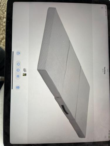 a tablet computer with a knife on the screen at Appartementen Purmerend B in Purmerend