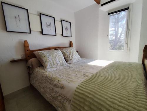 Postel nebo postele na pokoji v ubytování La Pigoussette