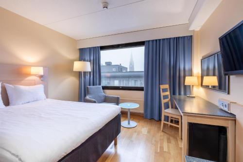 Ліжко або ліжка в номері Scandic Mikkeli