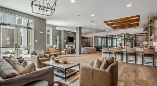 a living room with a couch and a table at Charming 2 bedroom in San Marcos in San Marcos