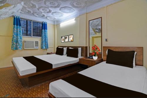 Voodi või voodid majutusasutuse Dear Hotel toas