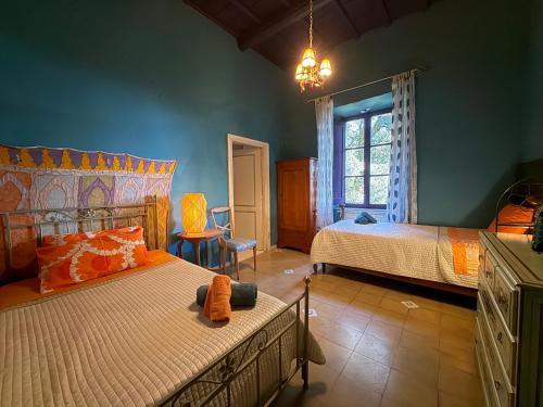 Ένα ή περισσότερα κρεβάτια σε δωμάτιο στο Casa Portale