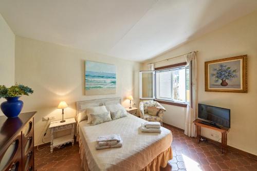 Postel nebo postele na pokoji v ubytování El Palomar