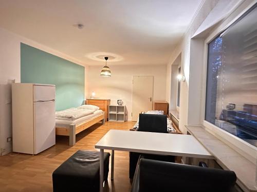 Postel nebo postele na pokoji v ubytování Pension Hostel Herdorf