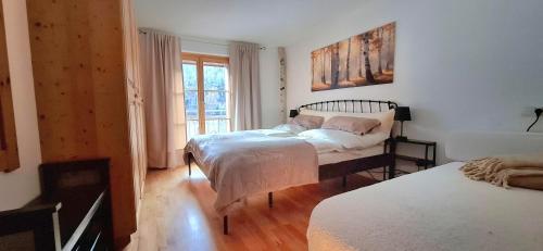 Ένα ή περισσότερα κρεβάτια σε δωμάτιο στο Conny´s Lodge