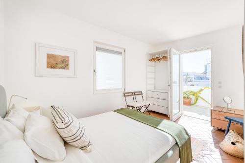 Ένα ή περισσότερα κρεβάτια σε δωμάτιο στο Zorora House