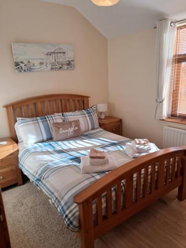 Voodi või voodid majutusasutuse Pebble Creek Apartment toas