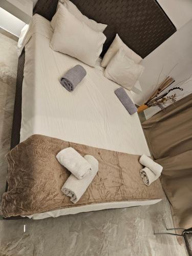 Ένα ή περισσότερα κρεβάτια σε δωμάτιο στο Casa Blue Sarantis