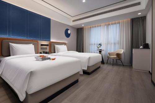 Φωτογραφία από το άλμπουμ του OKDAY Hotel Hengyang Nanhua University Jiefang Xi Road στο Χενγκγιάνγκ