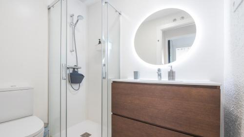 a bathroom with a sink and a mirror at San Torcuato VIII by Toledo AP in Toledo