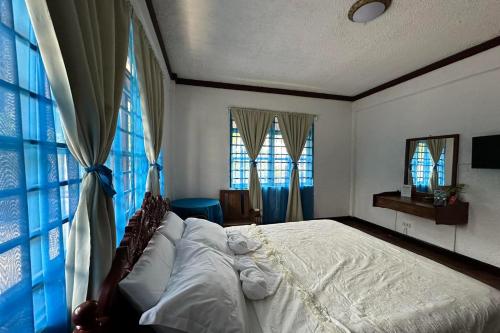 Ένα ή περισσότερα κρεβάτια σε δωμάτιο στο Hardin De Corales