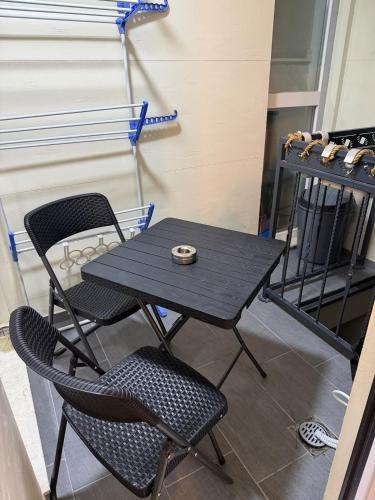 a table and two chairs with a bowl on top at A place that will make you feel at your home! in Gjilan