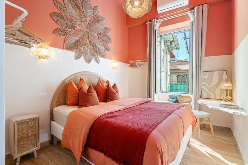 En eller flere senge i et værelse på Cap Riviera charme calme Menton, plage