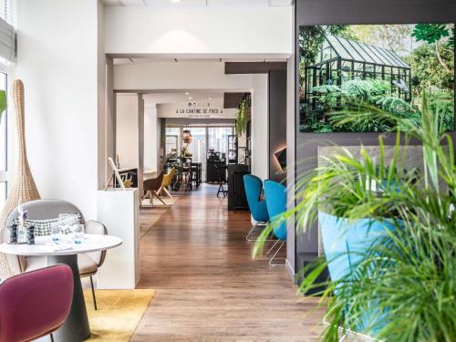 Posezení v ubytování Hotel Novotel Evry Courcouronnes