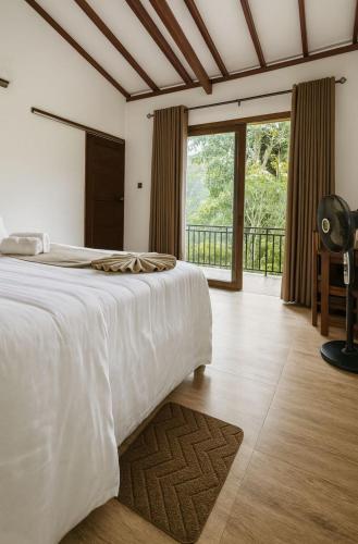 Ένα ή περισσότερα κρεβάτια σε δωμάτιο στο Road House Ella