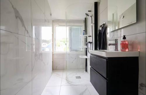 Ένα μπάνιο στο Family & Worker Accommodations in Göteborg