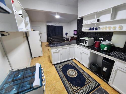 Η κουζίνα ή μικρή κουζίνα στο Jetsetter's Guest House