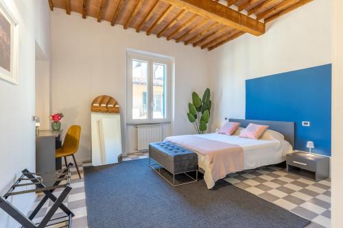 Ένα ή περισσότερα κρεβάτια σε δωμάτιο στο Heart Of Pisa