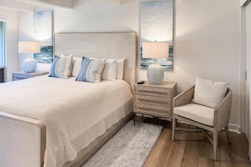 En eller flere senge i et værelse på Pali Ke Kua #215