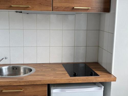 Η κουζίνα ή μικρή κουζίνα στο Super appartement