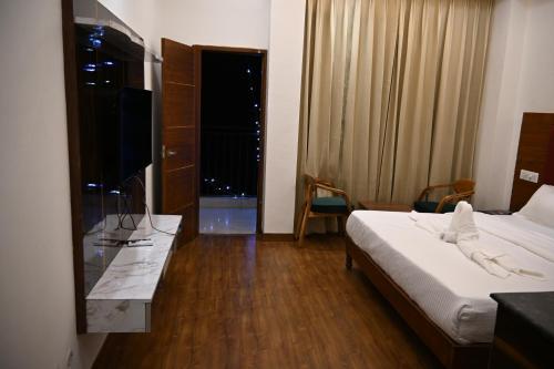 Postel nebo postele na pokoji v ubytování PD Residency