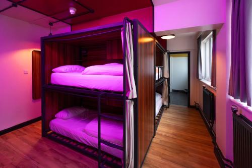 Ένα ή περισσότερα κρεβάτια σε δωμάτιο στο Malacuna Liverpool