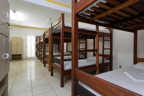 Ένα ή περισσότερα κρεβάτια σε δωμάτιο στο Pousada Hebrom