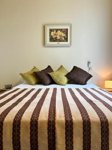 En eller flere senge i et værelse på Departamento ruta 22 Plottier