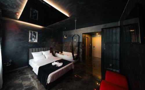 Ένα ή περισσότερα κρεβάτια σε δωμάτιο στο Amour Studio - Jacuzzi