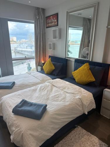 Voodi või voodid majutusasutuse Stylish & Spacious 2BR 2BA, 02 Greenwich toas