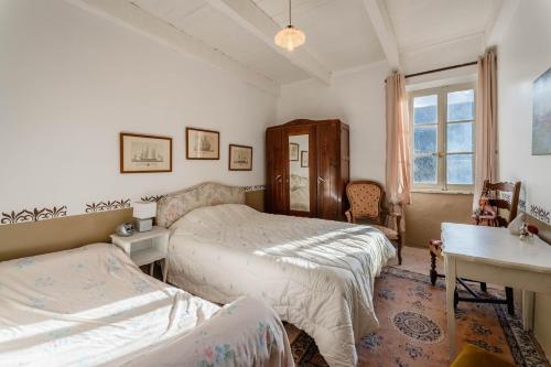 Ένα ή περισσότερα κρεβάτια σε δωμάτιο στο Appart agréable la Salvetat Agout