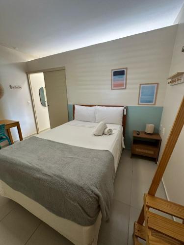 Postel nebo postele na pokoji v ubytování Viva Praia Flats, maravilhosa hospedagem na praia!