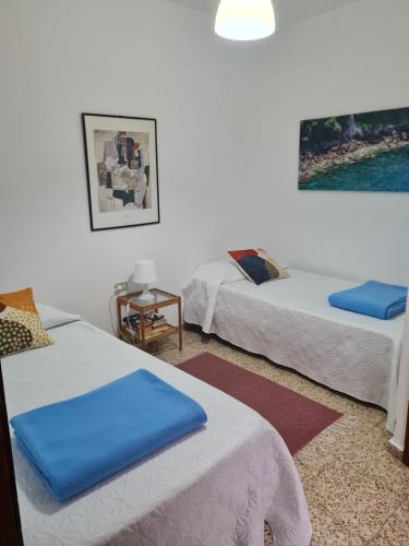 Ένα ή περισσότερα κρεβάτια σε δωμάτιο στο Ático con terraza Anexa, Garachico.