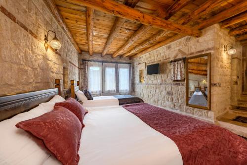 Ένα ή περισσότερα κρεβάτια σε δωμάτιο στο Zula Cave House