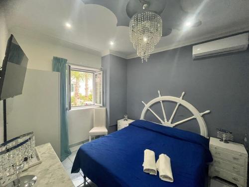 Ένα ή περισσότερα κρεβάτια σε δωμάτιο στο Network Forio ischia 4 stelle promo pensione completa con bevande