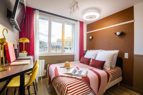 Ένα ή περισσότερα κρεβάτια σε δωμάτιο στο ARK Hôtel Paris Boulogne