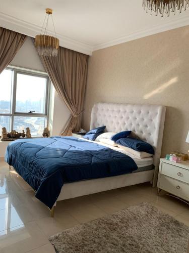 Ένα ή περισσότερα κρεβάτια σε δωμάτιο στο Luxury Room in Ajman