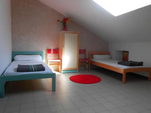 Voodi või voodid majutusasutuse Gîte La Renardière toas