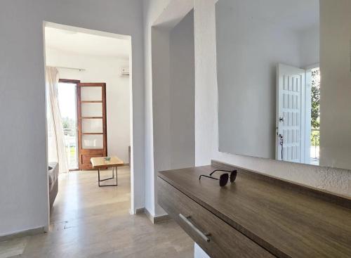 Φωτογραφία από το άλμπουμ του Theros Apartments στη Μόλα Καλύβα